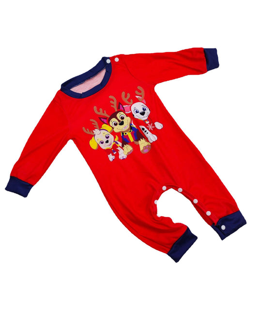 Woman in red Paw Patrol Christmas pajama top and navy fair isle bottoms with Santa Pups and reindeer. - Image 2