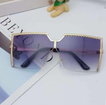 Frameless conjoined sunglasses with gold metal frame and braided detail, featuring brown gradient lenses. - Image 4