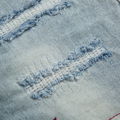 Jeans Holgados Retro con Rotos y Parches para Hombre - Image 4