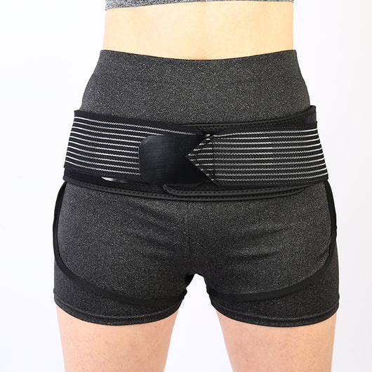Black adjustable retractable hip lifter correction support belt, folded on a white background. - Image 5