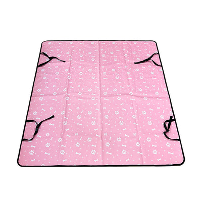 Pink car pet mat with white paw print and bone patterns, featuring black straps for securing to a rear seat. - Image 11