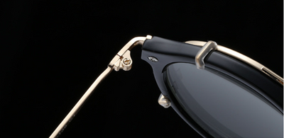 Round frame sunglasses with light blue mirrored lenses and a gold-tone metal frame, featuring a double bridge. - Image 17