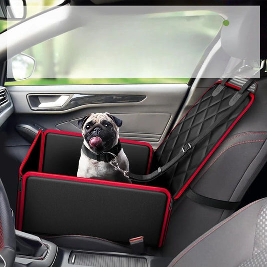 Black quilted pet car seat booster with adjustable straps and a leash attachment, designed for front seat use.