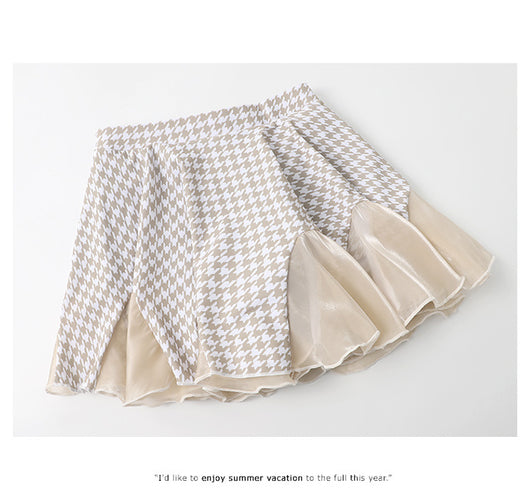 Women's conservative two-piece swimsuit with beige and white houndstooth pattern, sheer puff sleeves, and a flared skirt. - Image 22