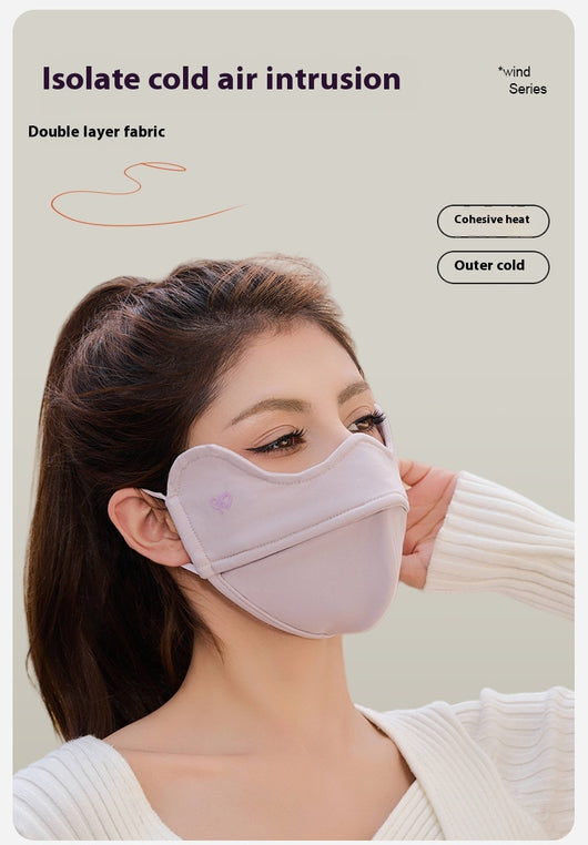 Woman wearing a grey outdoor cycling wind mask with ear hooks and a small heart logo, designed for cold-proof eye protection. - Image 10