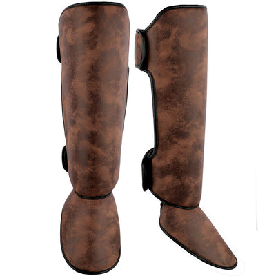 Pair of brown and black thickened shin guards for fighting and boxing, featuring a distressed leather-like texture. - Image 5