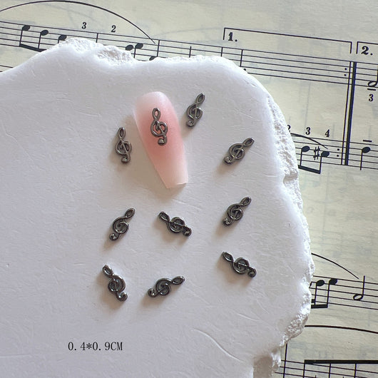 Accesorios de Uñas Metálicos con Símbolos Musicales - Image 9
