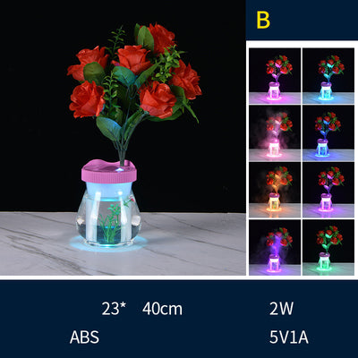Creative desktop humidifier with artificial red roses, clear base, pink top, and color-changing LED light mist. - Image 9