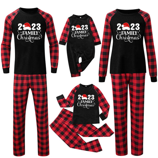 Red and black buffalo plaid Christmas pajama set with a long-sleeve top and matching pants. Top reads "2023 FAMILY Christmas". - Image 2