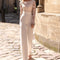 Jumpsuit Elegante de Encaje Blanco con Cintura Alta y Mangas Largas