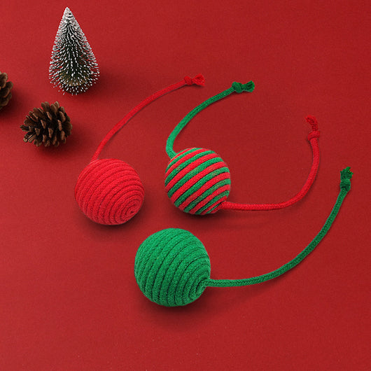 Red and green striped cotton rope ball cat toy with two rope tails, ideal for Christmas interactive play. - Image 4