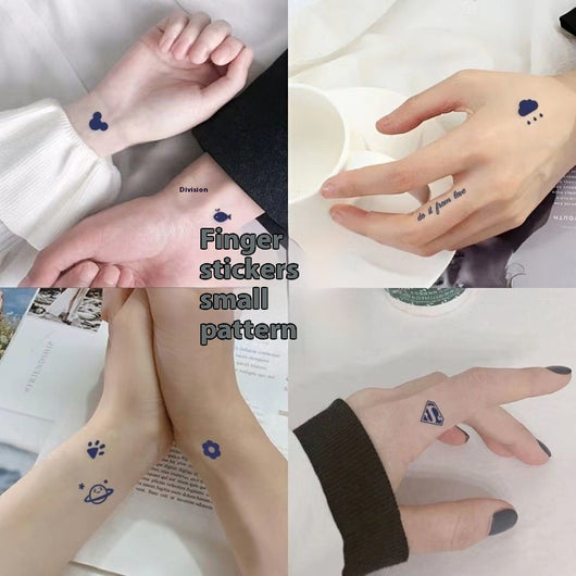 Sheet of 24 black outline doodle temporary tattoo stickers including a bow, heart, crown, sun, stars, and flowers.