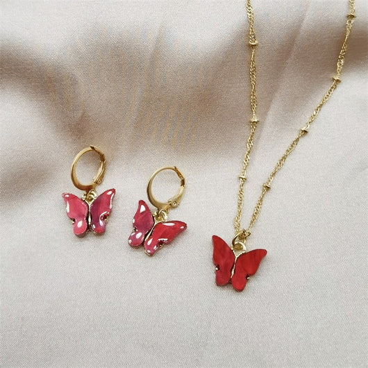 Pink acrylic butterfly necklace and earring set with gold-colored chain and hoop earrings. - Image 10