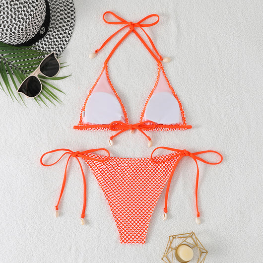 Blue and white mesh triangle bikini set with tie-side bottom and shell accents, displayed on a white beach towel. - Image 15