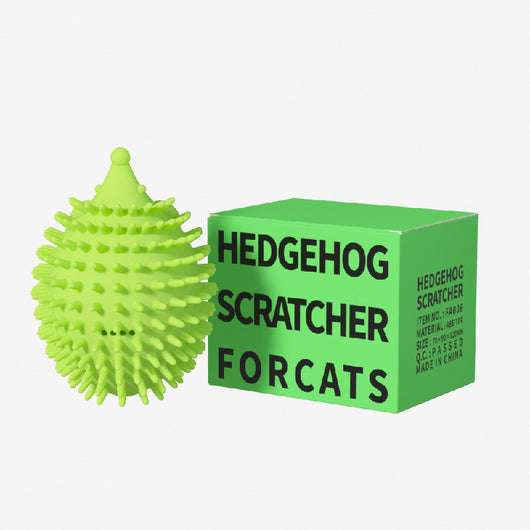 Lime green hedgehog-shaped cat toy with soft spikes, next to its matching green packaging box. - Image 3