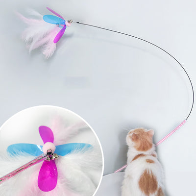 Fluffy pink feather cat toy replacement head with iridescent purple and blue wings, small bells, and a hook. - Image 12
