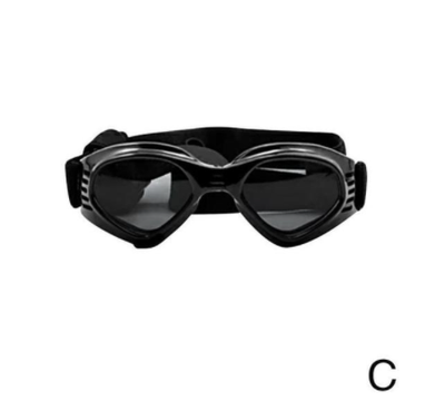 Black pet helmet with an adjustable chin strap and a pair of black pet goggles with an elastic strap. - Image 6