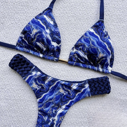 Women's blue, white, and gold marble print bikini with a triangle halter top and braided rope side details. - Image 3
