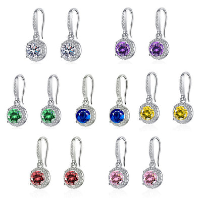 Aretes Moissanita Redondos de Cuatro Puntas - Image 2