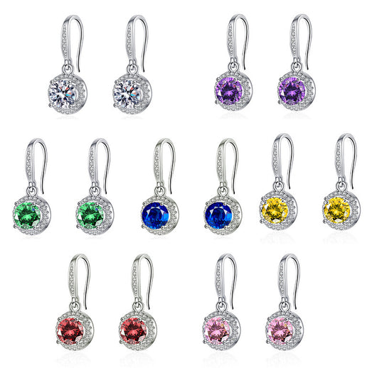 Aretes Moissanita Redondos de Cuatro Puntas - Image 2