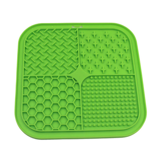 Gray silicone pet licking pad with four textured sections, designed for slow feeding and anti-choking. - Image 6