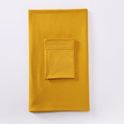 Black minimalist modal bottom hat integrated scarf, folded neatly on a white background. - Image 3