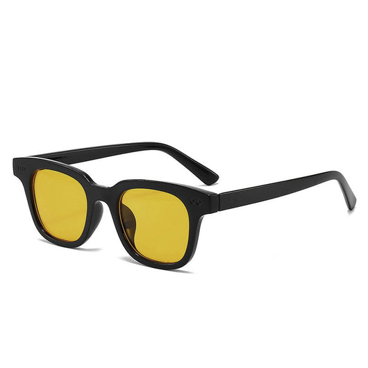 Black frame square sunglasses with light blue lenses, angled on a white background. - Image 4