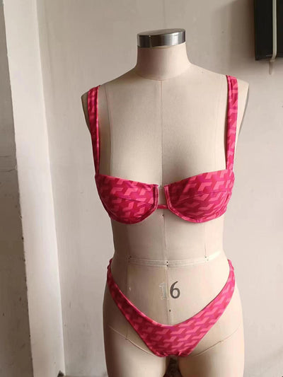 Women's pink and red geometric print bikini with underwire top and high-cut bottoms, styled with a white shirt. - Image 10