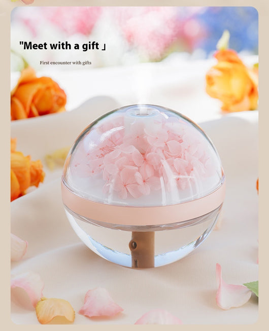 Pink round mini humidifier with clear dome, decorative pink flowers, and a light-up base, ideal for desktop or bedroom. - Image 19