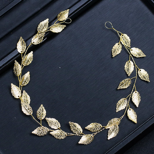 Diadema Elegante con Detalles de Oro y Plata