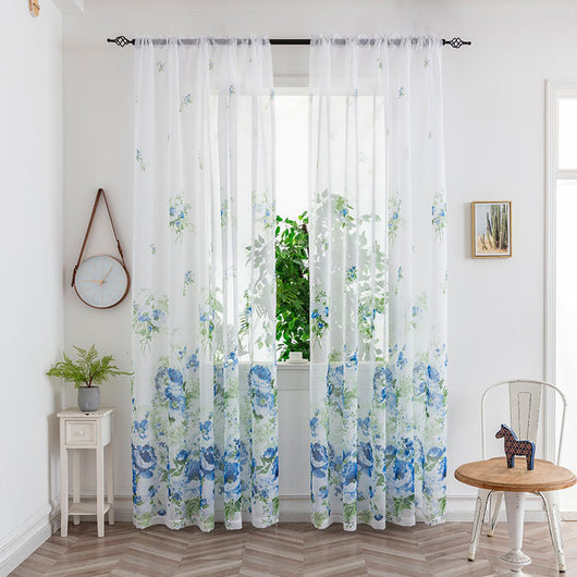Sheer white mesh curtains with purple and light blue floral patterns, hung on a black rod in a bright room. - Image 6