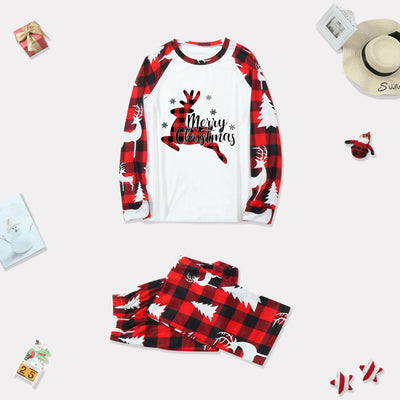Family matching Christmas pajamas with red and black buffalo plaid, white reindeer, and Christmas tree prints. - Image 5