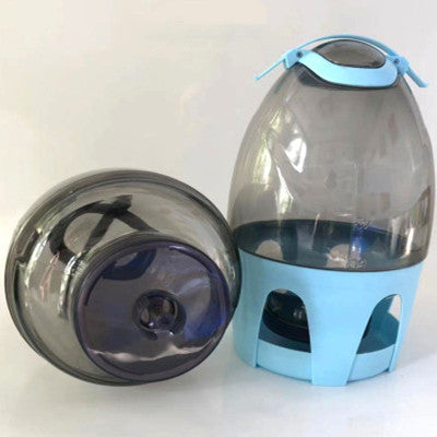 Transparent pet drinker with a light blue base and handle, designed for chickens or small birds. - Image 24