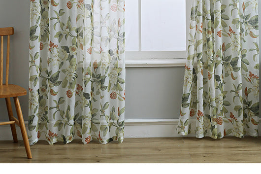 Dark gray semi-sheer curtains with a white and green floral pattern, hung on a black rod in a living room. - Image 15