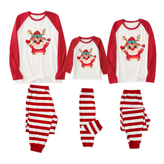 Family matching Christmas pajamas with red raglan sleeve tops featuring a cartoon reindeer and red and white striped pants. - Image 10