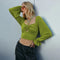 Blusa Crop Top con Mangas Abullonadas y Detalles Calados