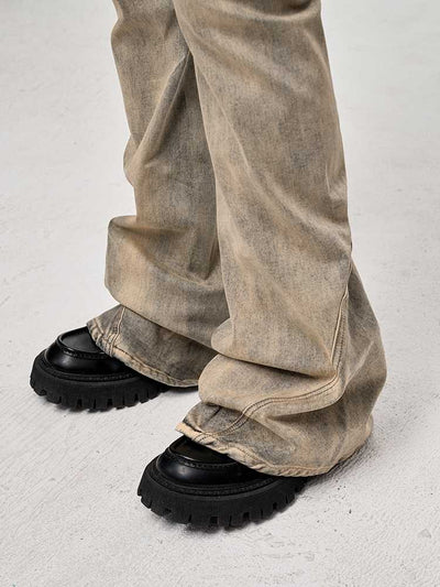 Jeans Desgastados con Efecto Teñido y Costuras Mezcladas - Image 9