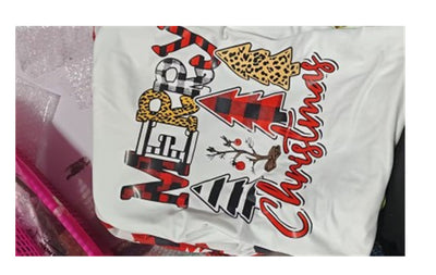 Matching family Christmas pajamas with white tops, red and black plaid sleeves, and pants featuring deer and trees. - Image 2