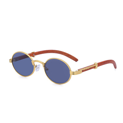 Retro oval sunglasses with gold metal frames and dark wood-like temples, featuring gradient black lenses. - Image 8