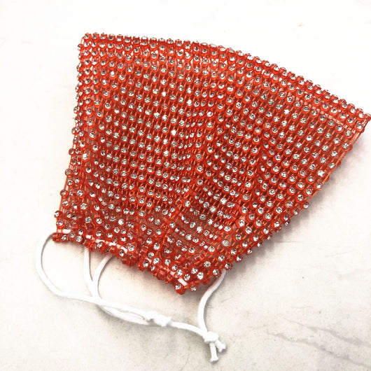 Close-up of a blue mesh fabric adorned with numerous small, clear rhinestones, creating a sparkling texture. - Image 9