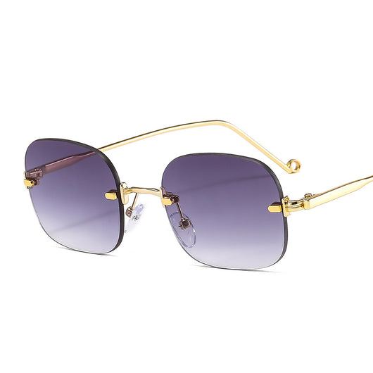 Frameless square sunglasses featuring vibrant blue lenses and sleek gold-colored metal temples and bridge. - Image 14