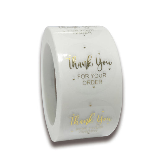 Roll of transparent round adhesive stickers with gold foil "Thank You!" text in a decorative script font. - Image 3