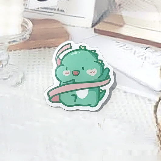 Cute green cartoon dinosaur acrylic badge brooch with a shy expression and small spikes on its back. - Image 12