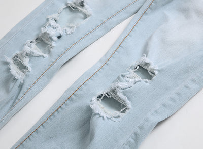 Jeans Slim Fit Azul y Blanco con Diseño de Agujeros Grandes - Importación - Image 6