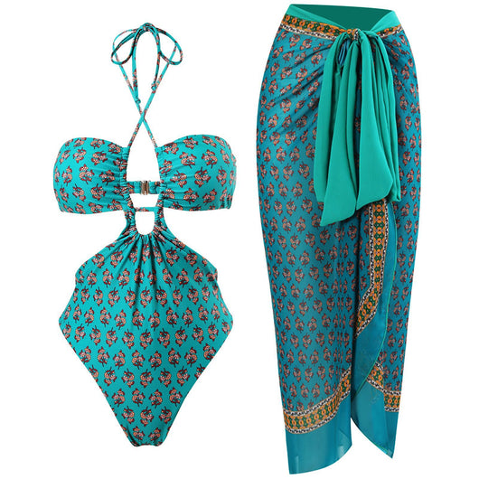 Dark green floral one-piece swimsuit with halter neck, bandeau top, cut-outs, and matching sheer sarong. - Image 4