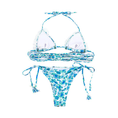 Women's blue and green paisley print bikini with white lace trim, triangle halter top, and tie-side bottoms. - Image 5