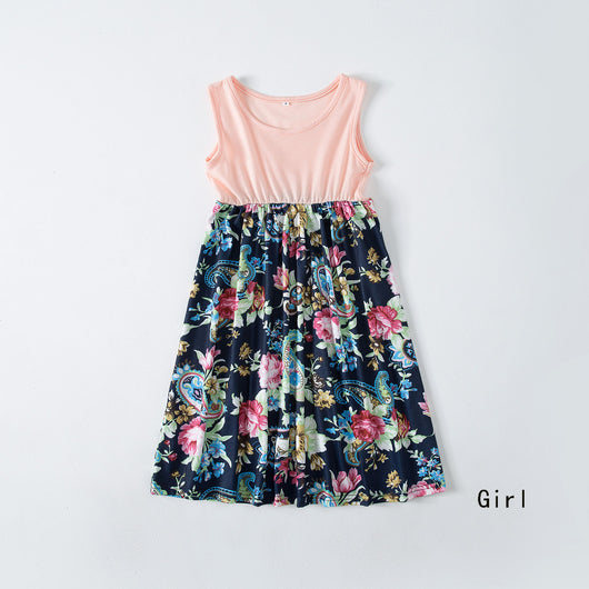Family matching outfits including a peach and floral maxi dress, two short-sleeve shirts, a sleeveless dress, and a baby romper. - Image 5