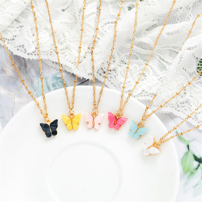Pink acrylic butterfly necklace and earring set with gold-colored chain and hoop earrings. - Image 15