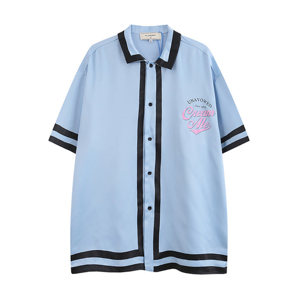 Playera de Manga Corta con Bloques de Color e Impresión de Letras