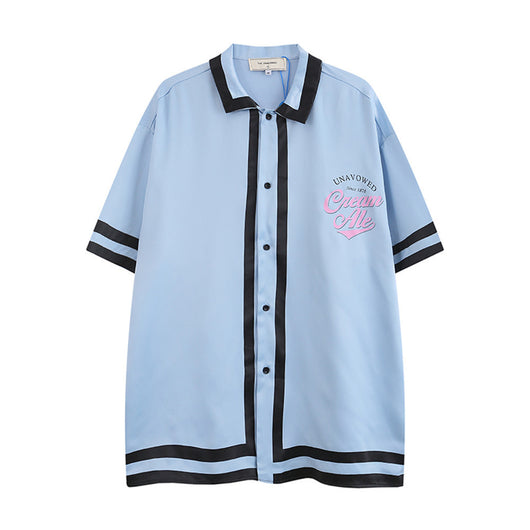Playera de Manga Corta con Bloques de Color e Impresión de Letras